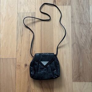 Palazzo black and rhinestone evening bag.
